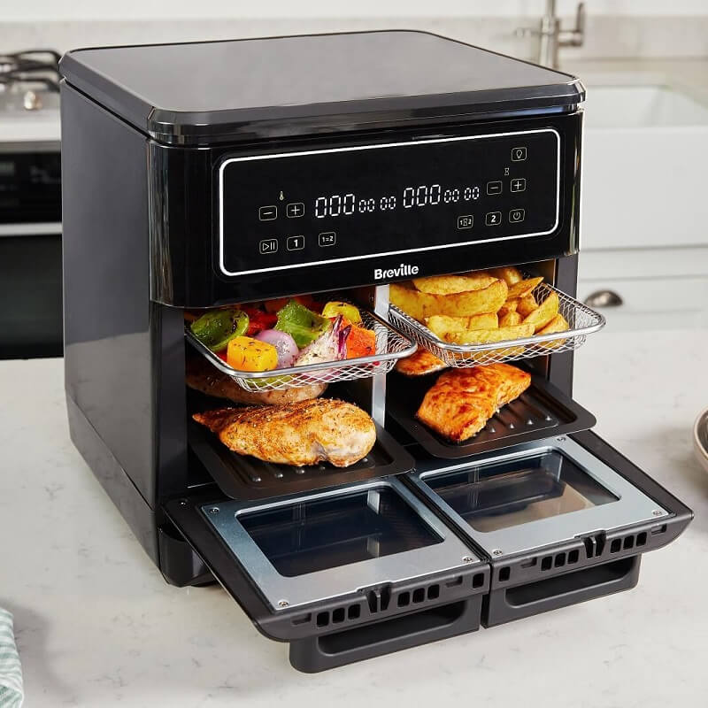 Frytkownica beztłuszczowa Breville VDF130X o pojemności 11 litrów pozwala na smażenie, pieczenie, grillowanie i odgrzewanie przy minimalnym użyciu oleju